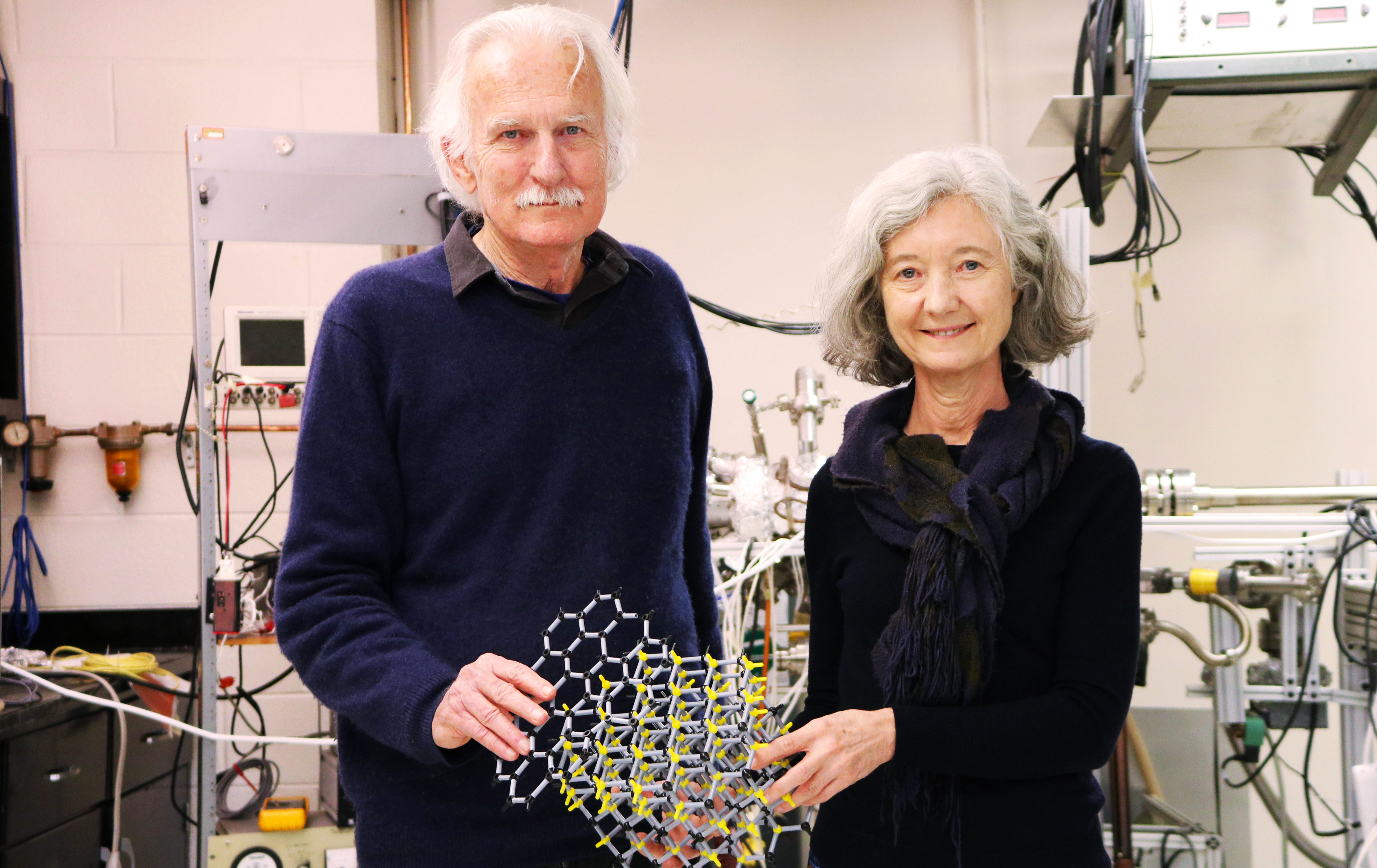 Walter de Heer and Claire Berger with a model of how computer chip material is made (Photo Jess Hunt-Ralston).jpg